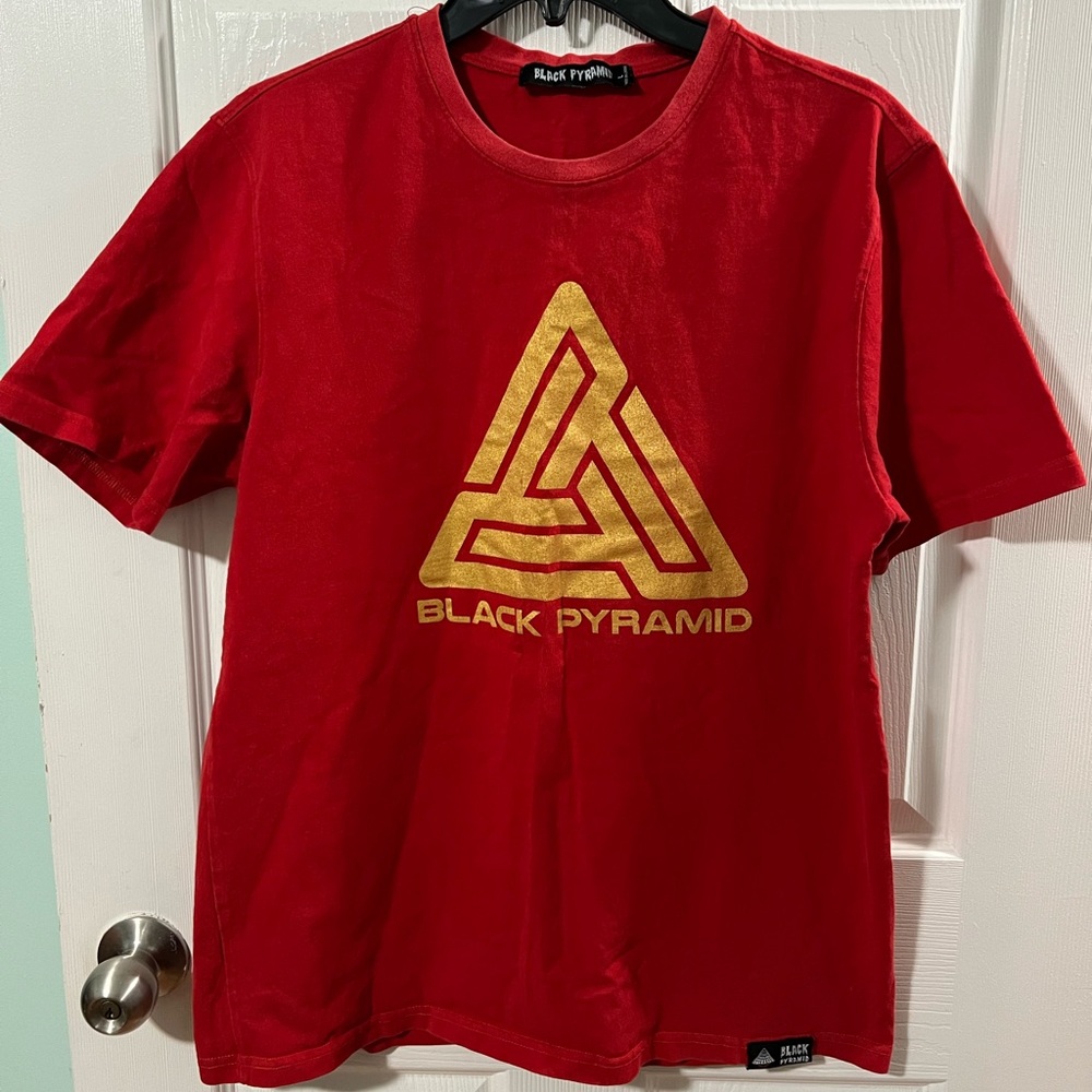 Black Pyramid Red Tee with Gold Emblem